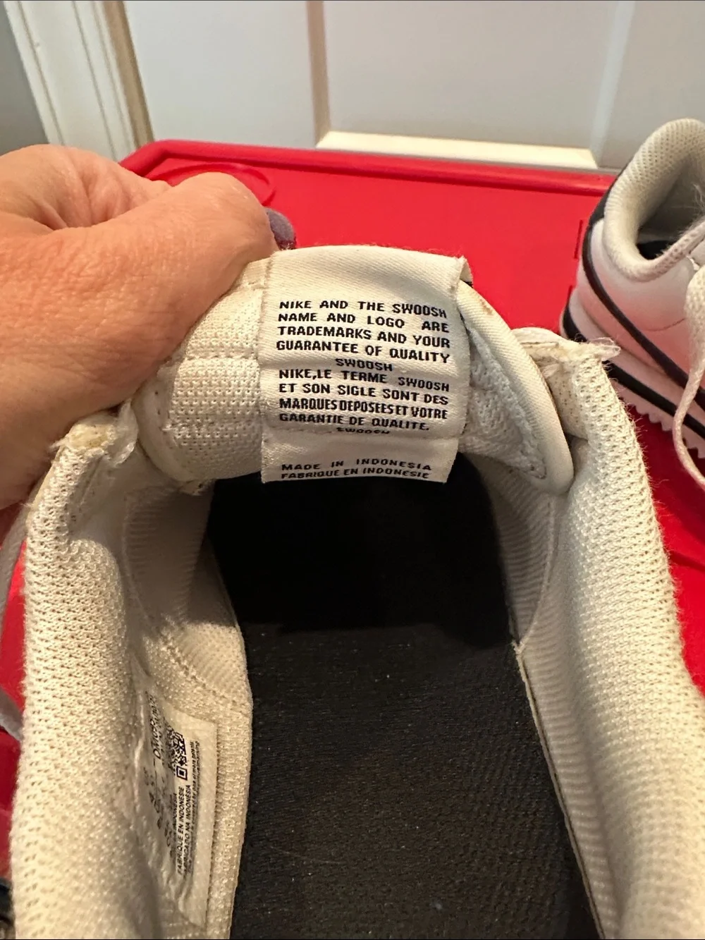 Nike Boy’s White Sneakers with Black Swoosh